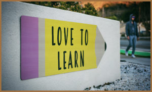 Sign that says 'Love to learn'
