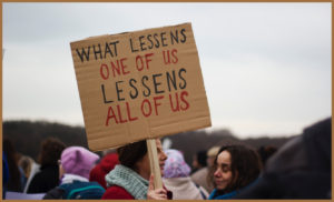 SEND Protests sigh that reads 'what lessons one of us lessens all of us'