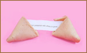 Fortune cookie with the message 'your patience with others is good'