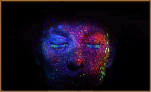Autistic Person with Neon Paint on
