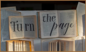 Books with 'turn the page' written on them