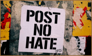 A sign that says 'Post no hate'