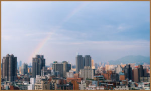 A rainbow over a city