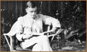 A young Alan Turing reading a book